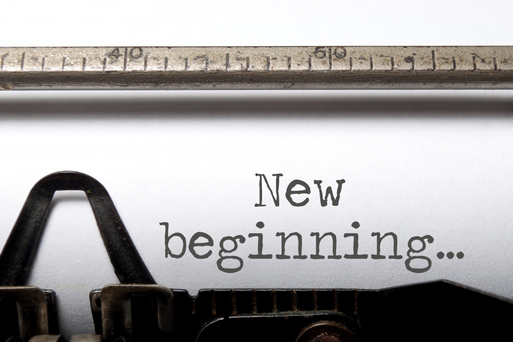 New beginning printed on an old typewriter